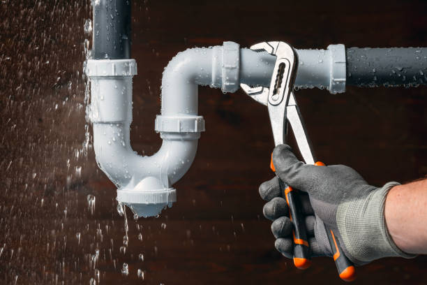 Professional Drain Cleaning technician working in Coralville, IA